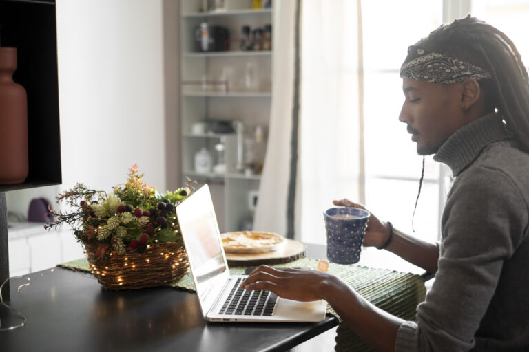 close-up-man-working-with-laptop